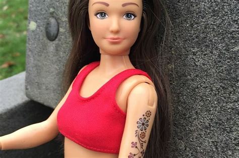 this normal barbie comes with cellulite stretch marks acne and tattoos