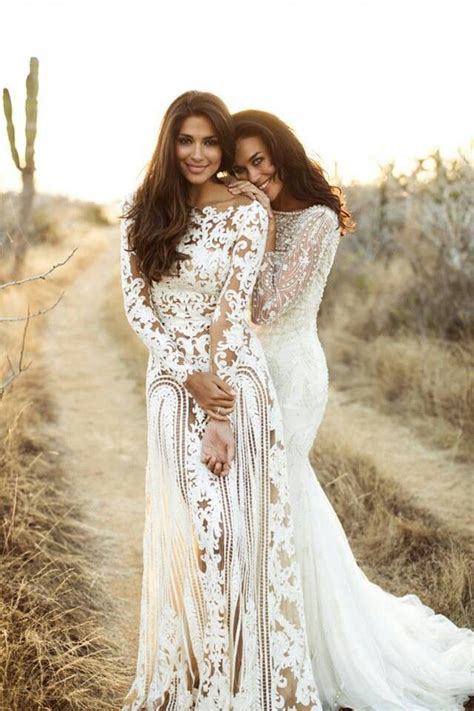 megan gale and pia miller in zuhair murad and bo and luca wedding dress gown bohemian beach