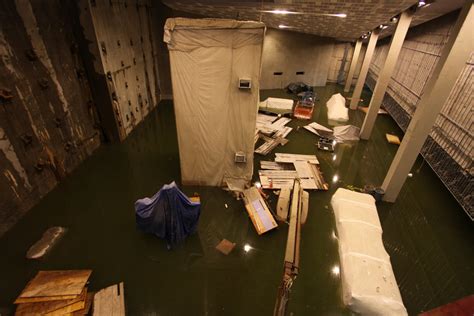 floodwater pours   museum hampering  work   site   york times