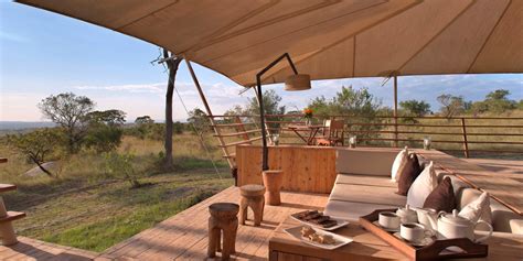 enjoy  view   serengeti plains   sunken deck  serengeti bushtops luxury tents