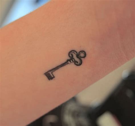 small key tattoo   wrist