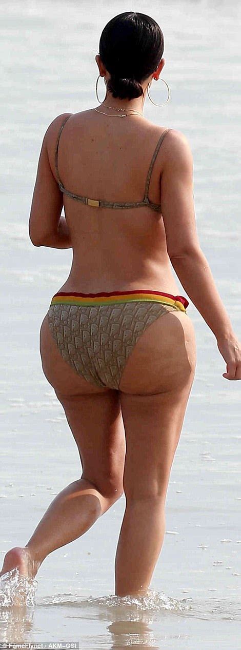 kim kardashian tries on another bikini after photo frenzy daily mail