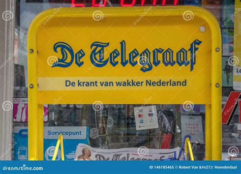billboard selling de telegraaf newspaper  amsterdam  netherlands