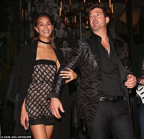 robin thicke brings girlfriend april love geary to catch