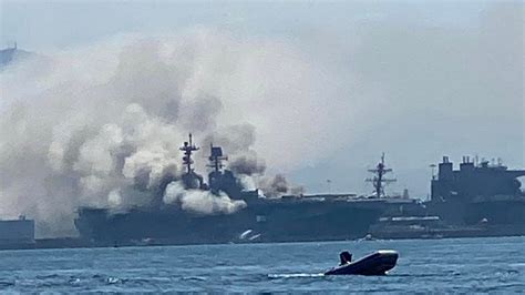 days   caught fire  navy warship   burning