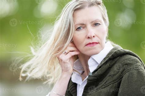 Portrait Of A Beautiful Elderly Blonde Woman Of European Appearance