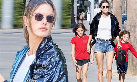 alessandra ambrosio shows off catwalk legs in frayed daisy dukes as she