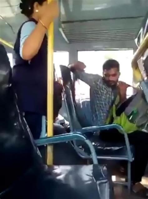 man caught performing sex act on a bus while looking at
