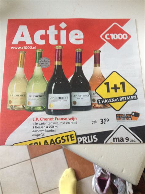 ad  actie wine  displayed   wall  front   tile floor