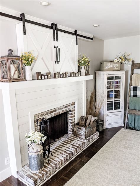 farmhouse mantle  tv barn doors  german smear