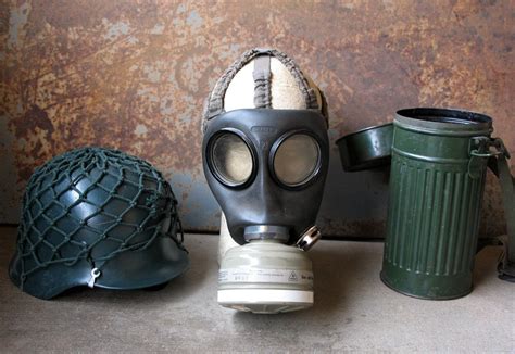 west german gas mask  helmet  storage canister collectors weekly