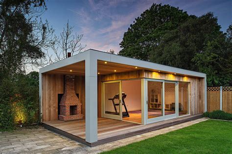 outdoor gym  sliding glass doors    surrounded  grass  trees