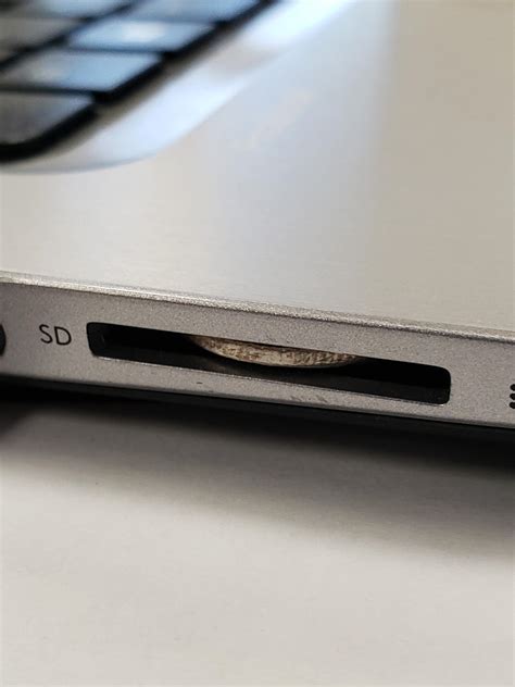 slpt   sd card slot   laptop  hide  extra change