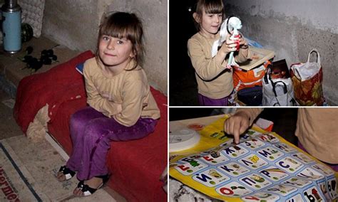 video shows ukraine child playing   dark  avoid shelling daily mail