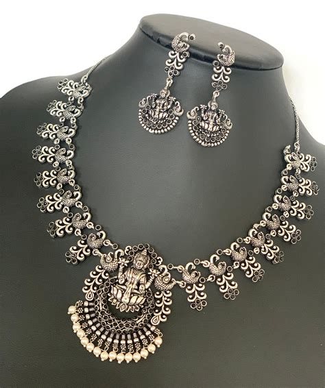 oxidized silver peacock necklace  matching jhumkas etsy   antique silver jewelry