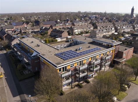 duurzame zonnestroom vanaf de daken van  wooncomplexen