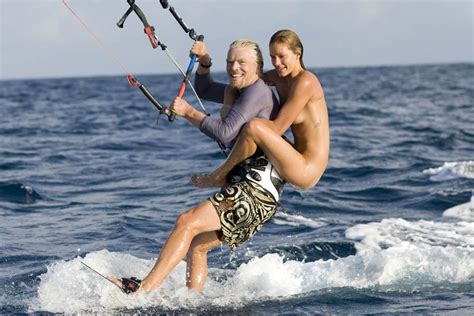 you may be cool but you ll never be richard branson kite surfing with a naked model on his back
