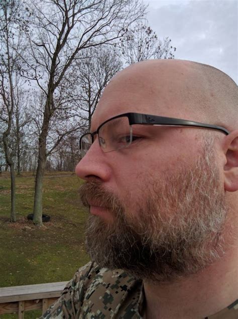 43 Shaved Head Glasses And Greying Beard Board