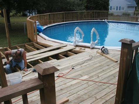ground pool connected  house deck google search