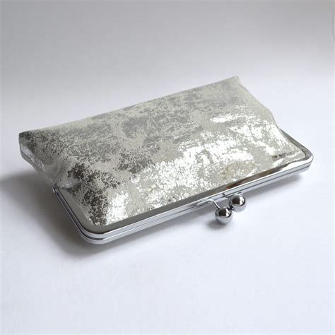 metallic silver clutch bag  kiss lock closure  vintage kimono lining