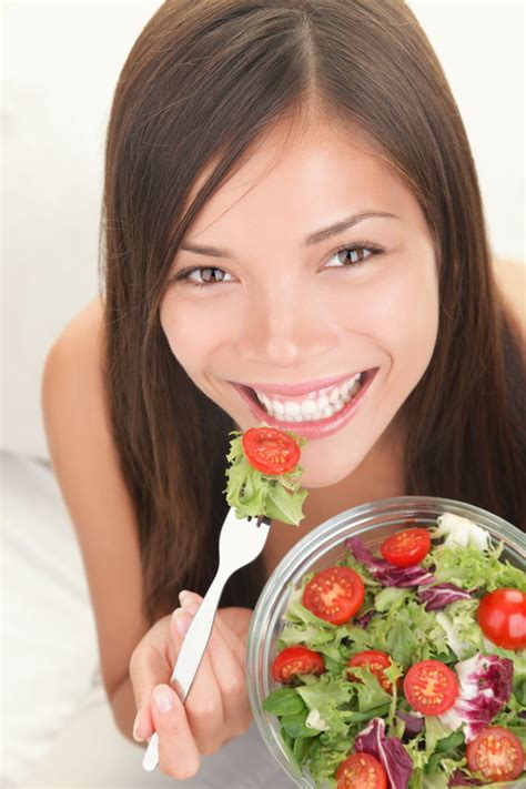 woman eating healthy salad simply real moms