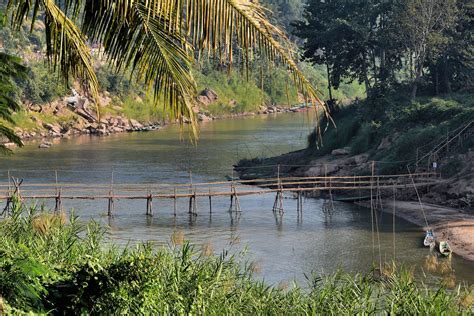 bamboo footbridge over nam khan river in luang prabang laos encircle