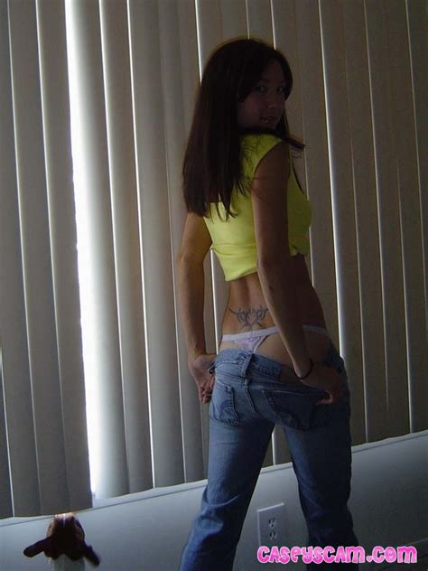 busty asian teen showing her yellow bra pichunter