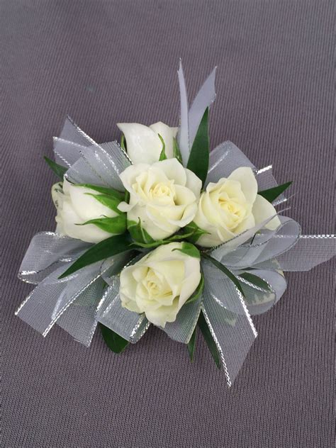 sweetest wrist corsage  images corsage wedding prom flowers prom corsage  boutonniere