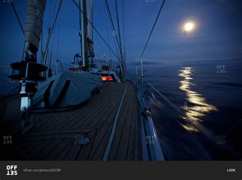 sailing boat yacht  night lighting system  full moon  atlantic crossing sailing