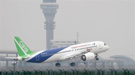 chinas  jetliner  comac  takes flight   time