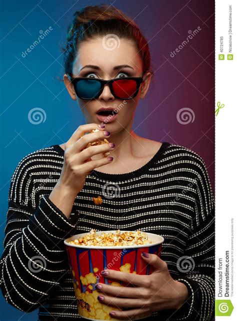 beautiful girl watching movie with 3d glasses stock image