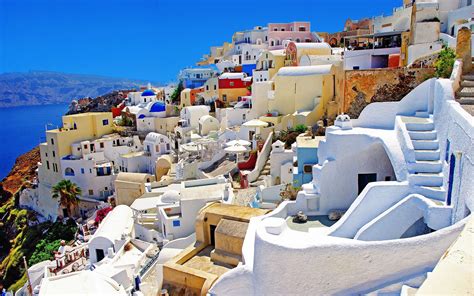 colorful houses  oia santorini greece beautiful places  places   world shut