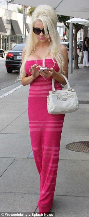 courtney stodden s pink maxi dress barely covers her new dd implants at lunch with husband doug