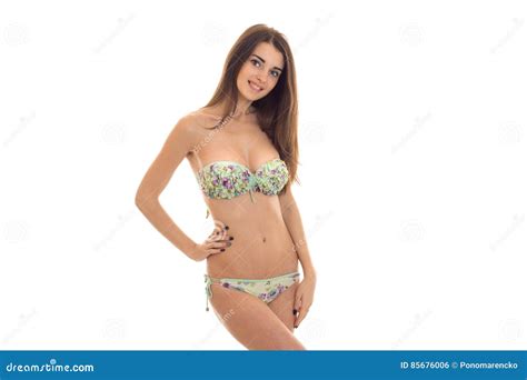 Portrait Of Sexual Charming Brunette Girl In Swimsuit Isolated On White