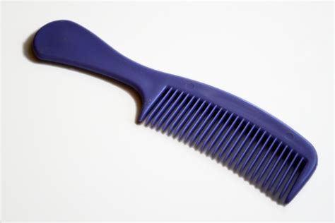 purple plastic comb  handle picture  photograph