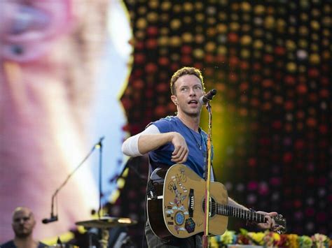Chris Martin During A Coldplay Concert A Head Full Of Dreams Tour Ahfod