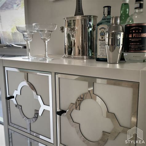 coming tomorrow     mirrored drinks cabinet