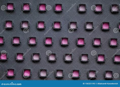 black perforated plastic  pink substrate symmetrical volumetric