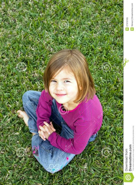 girl sitting on grass sex photo