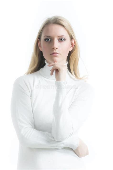 beautiful russian blonde girl on a white background in a white