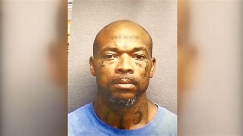 Wanted Armed Robbery Suspect Tattooed Social Security Number On His