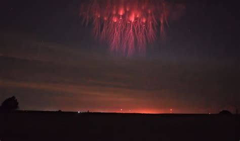 photographer spends career hunting  elusive red sprites