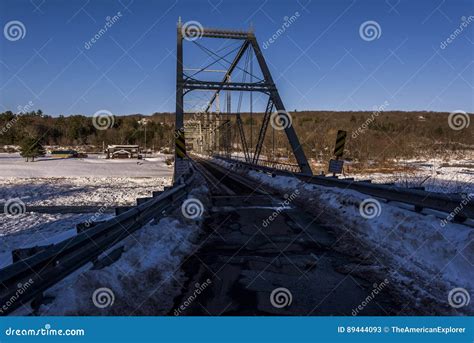 Winter Evening Scene At Historic Skinners Fall Truss Bridge Stock Image