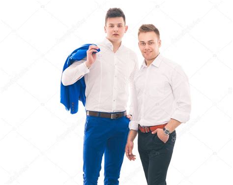 young  men standing isolated  white background stock photo