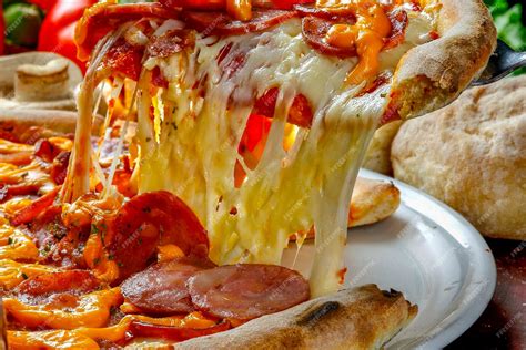 Premium Photo Pizza Slice Melted Cheese