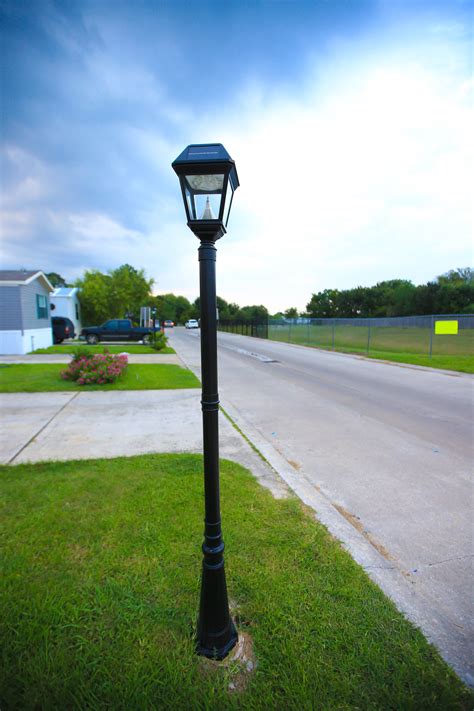 bright solar powered lamp post features integrated leds