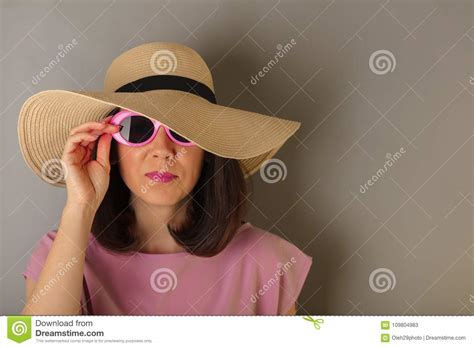 Woman In Pink Dress Hat And Sunglasses Stock Image Image Of