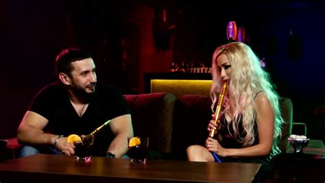 girl smokes a hookah at a party stock footage video 8469274 shutterstock