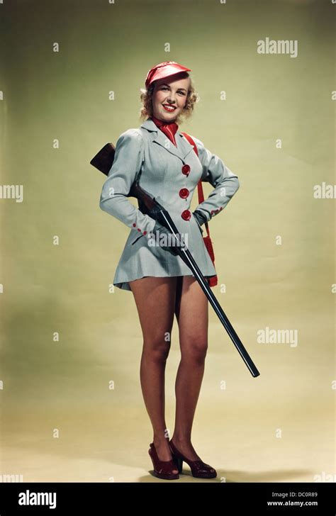 1940s 1950s Portrait Smiling Blond Woman Pinup Wearing Hunting Outfit