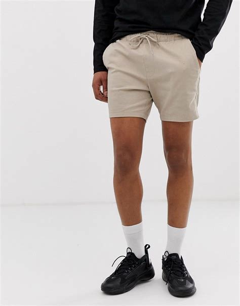 asos design skinny shorter chino shorts  elastic waist  beige beige asosdesign cloth